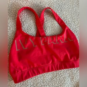 Ivy Park Shadow Logo Sports Bra in Neon Red XL